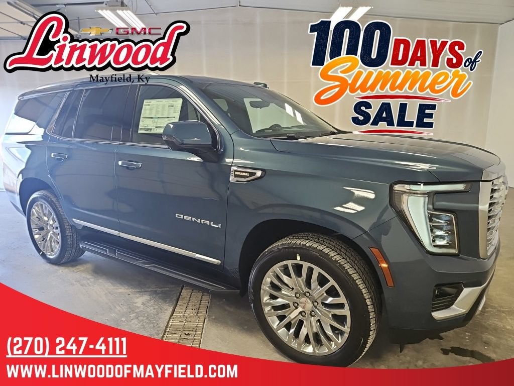 2026 GMC Yukon Denali in Downpour Metallic — front three-quarter view