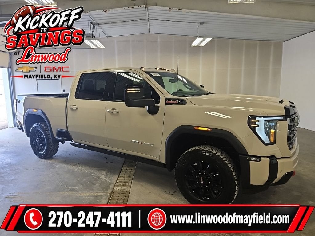 2026 GMC Sierra 2500 HD AT4 in Coastal Dune — front three-quarter view